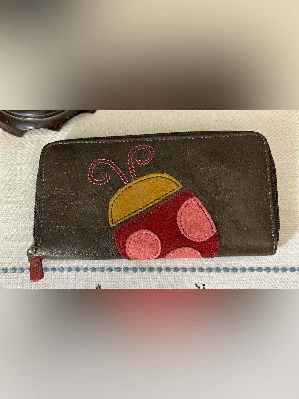 Fossil Brown Leather Wallet with Red Accent